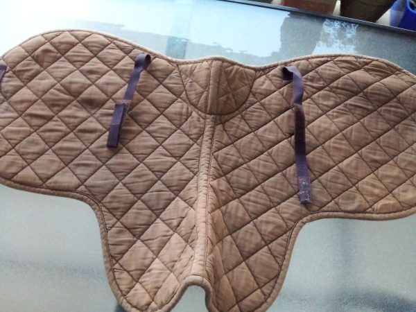 shaped saddle pad